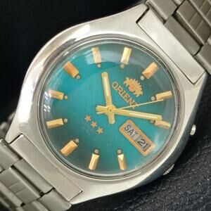 Vintage 1974 Orient Automatic Mens Silver Watch W/daydate & Blue accents